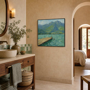 Fresh mountain lake art displayed in a quiet spa-like bathroom.