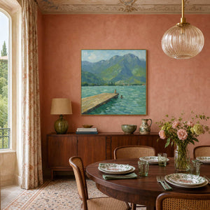Mountain lake wall art warming a refined classical dining room.