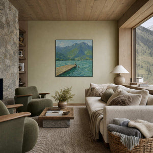 Textured mountain lake wall art displayed in a calm alpine living room.