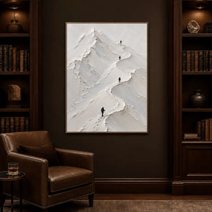 Sculptural mountain wall art displayed in a dark collector reading room.