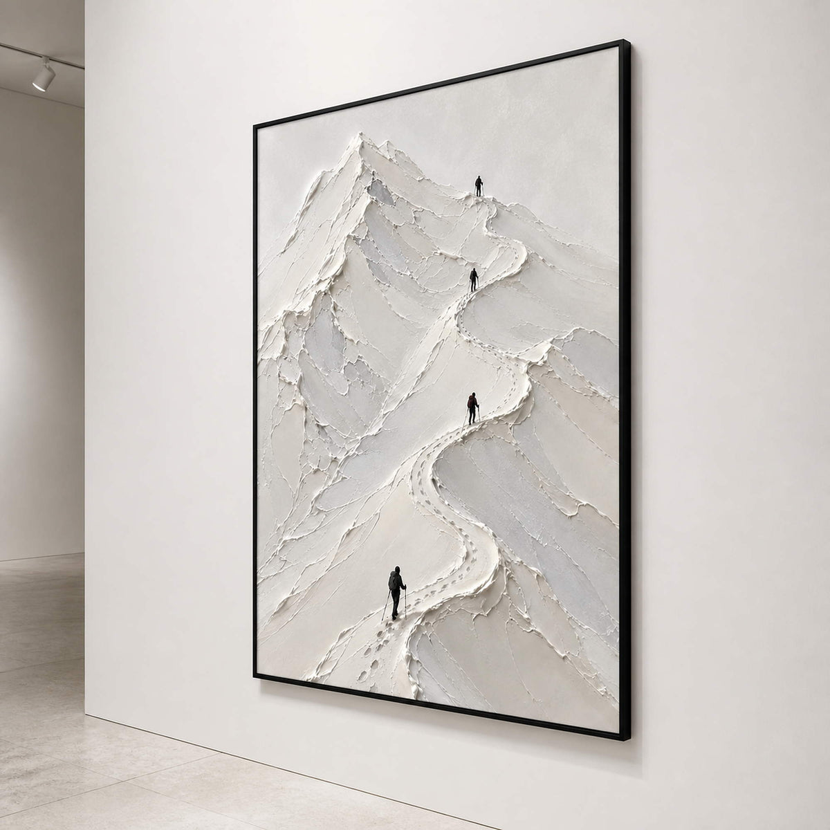 Vertical white mountain wall art viewed close-up on a gallery wall.