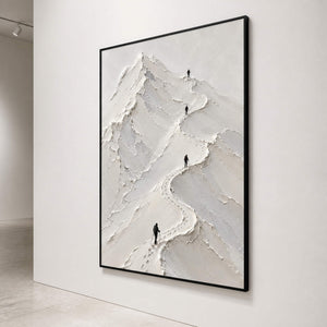 Vertical white mountain wall art viewed close-up on a gallery wall.