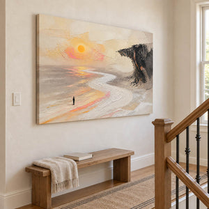 Landscape painting with a lone figure, amber sun, pale shore, and dark cliff without an outer frame on a stair landing.