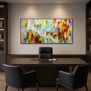 Colorful textured panoramic art displayed in a dark executive office.
