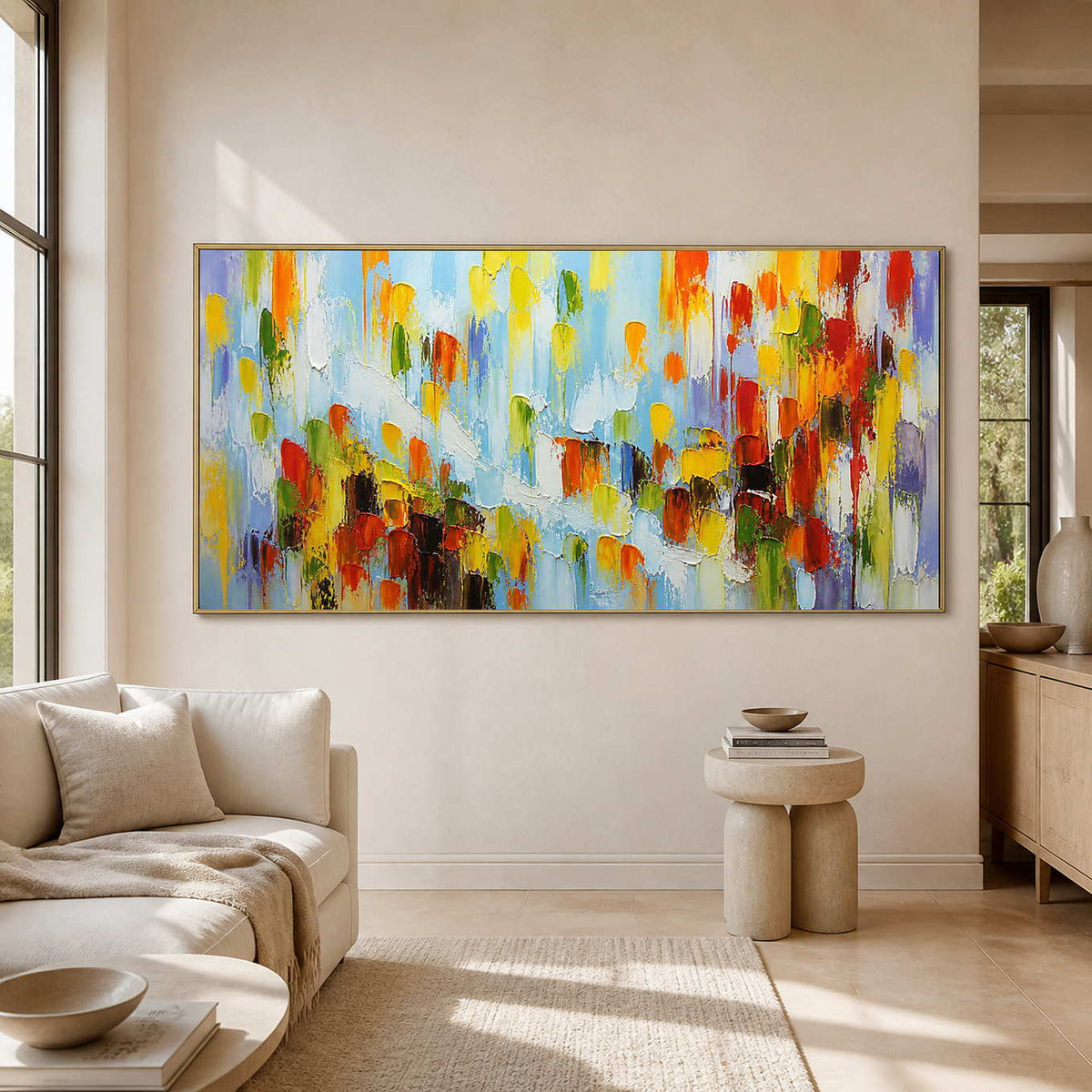 Panoramic colorful abstract wall art displayed in a sunlit modern lounge.