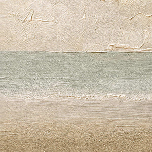 Close-up of raised ivory, pale green, and sand texture.