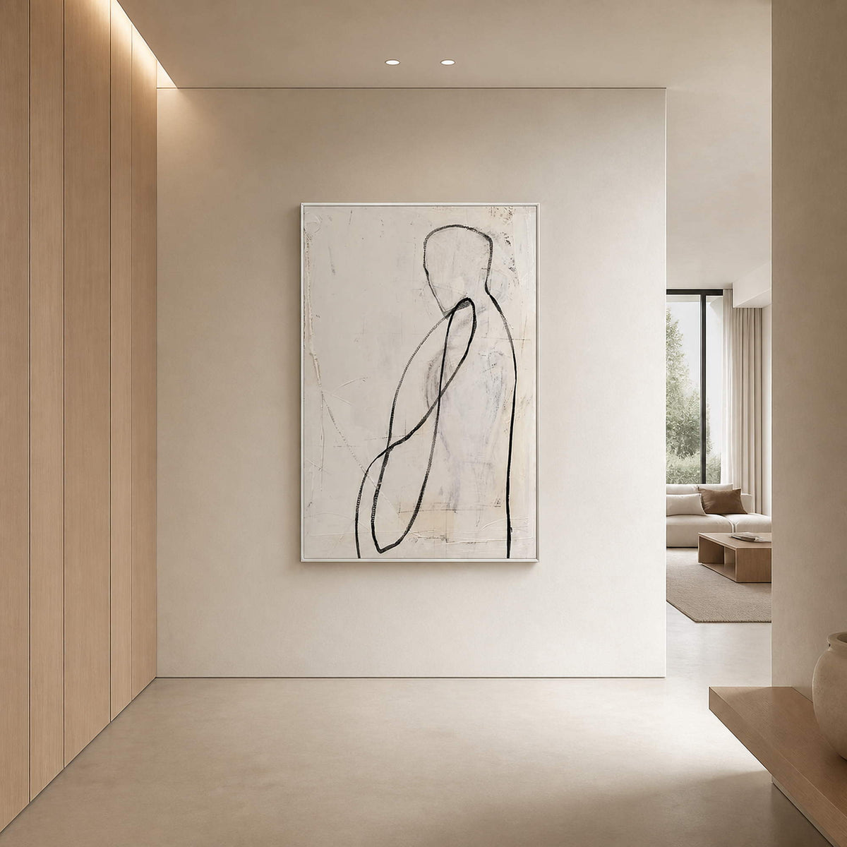 Minimalist vertical canvas styled in a bright cream residential entryway.
