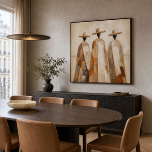 Textured portrait painting displayed in a sophisticated dining room.