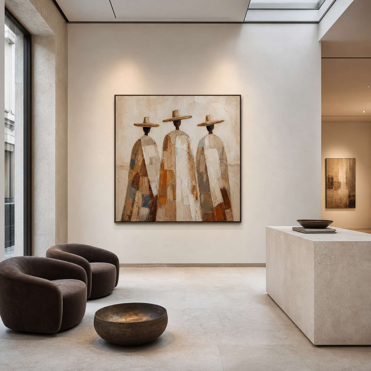 Large textured figurative wall art in a contemporary hotel lobby.