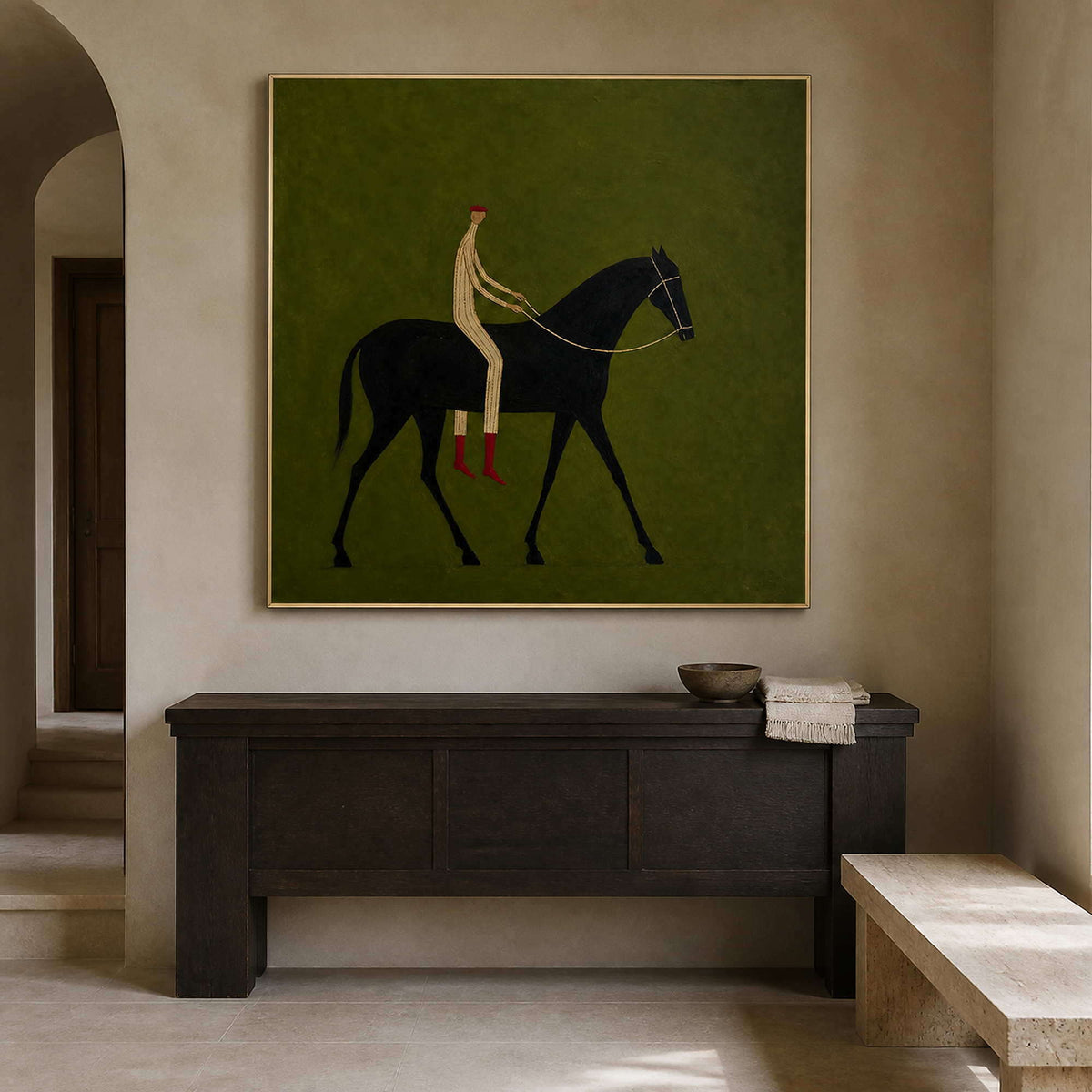 Minimalist equestrian wall art in a warm oatmeal entryway.