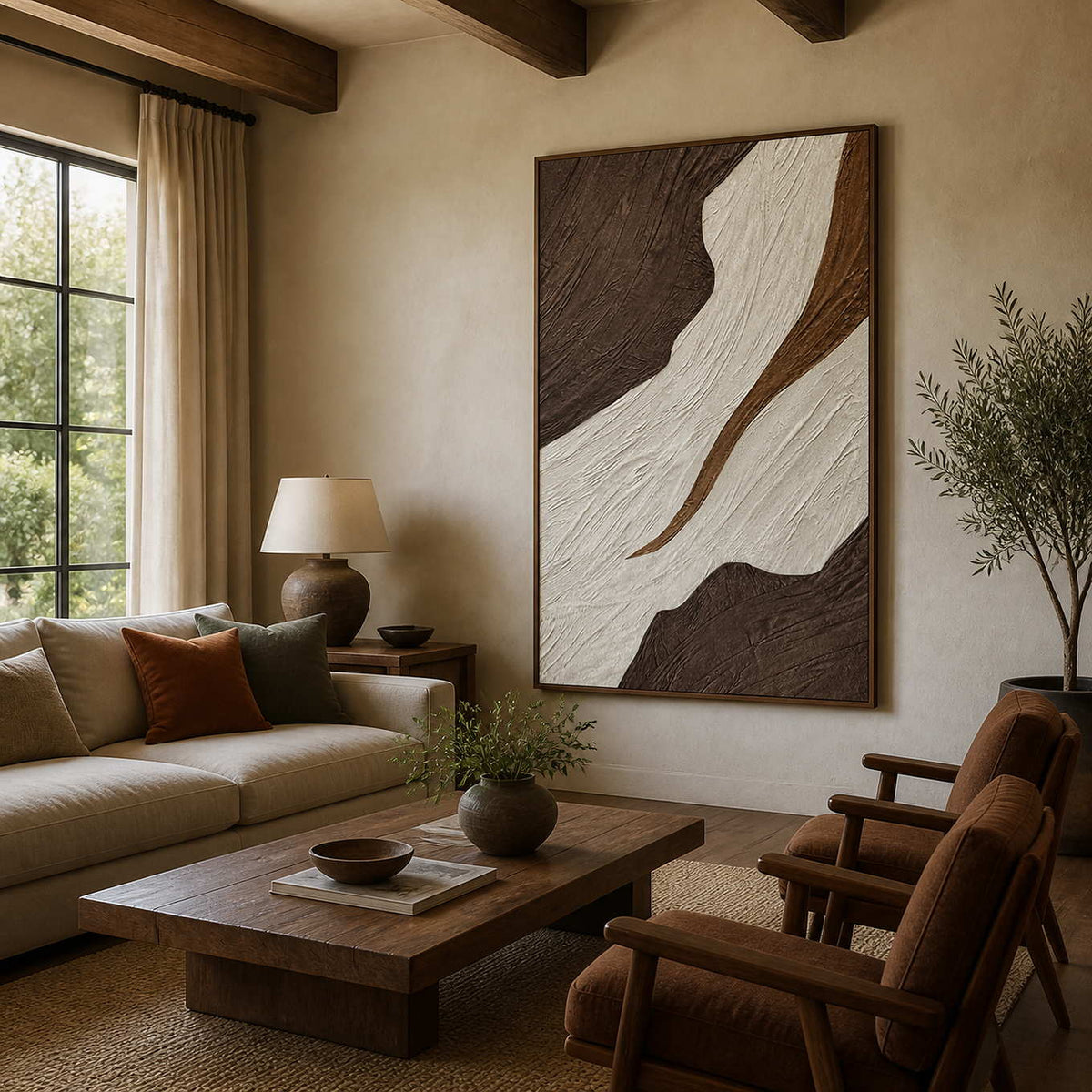 Wood-framed brown and ivory abstract wall art beside a sofa in a living room.