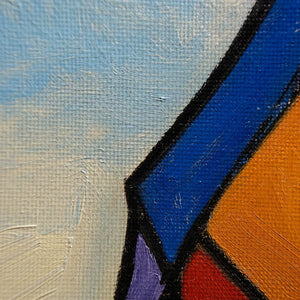 Close-up of hand-painted blue, orange, red, and black contours on canvas.