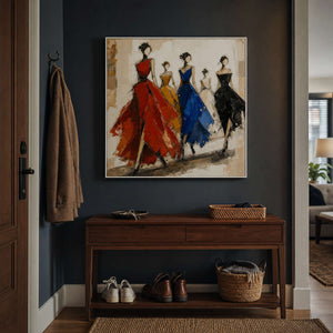 Colorful textured fashion wall art displayed above a console in a dark entryway.
