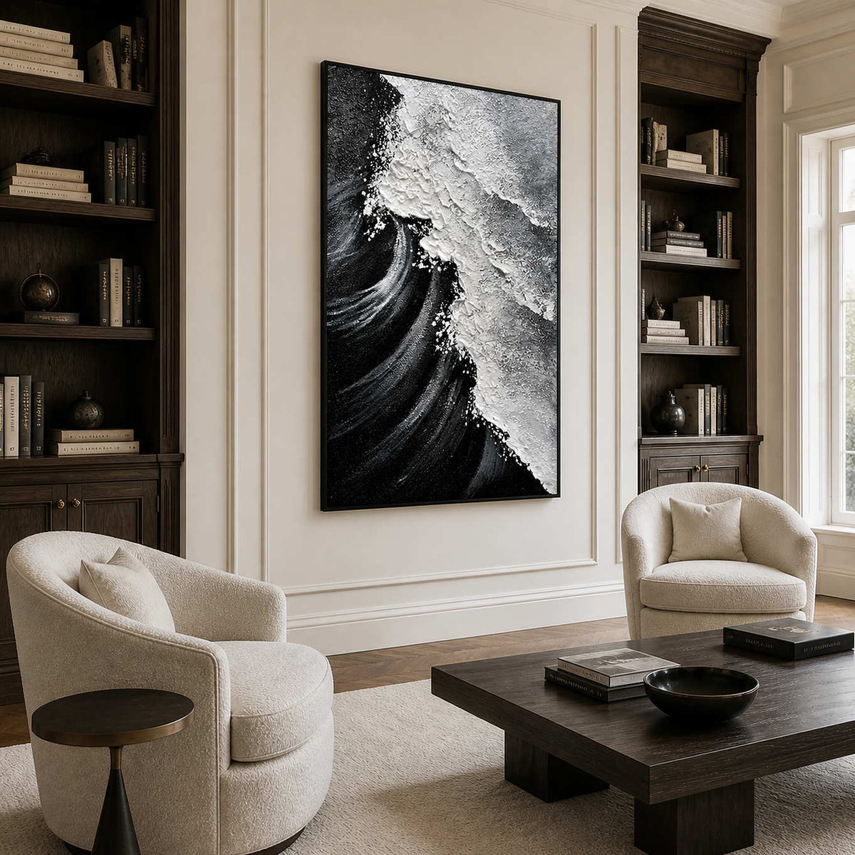 Black framed wave painting with white foam between walnut bookshelves in a reading lounge.