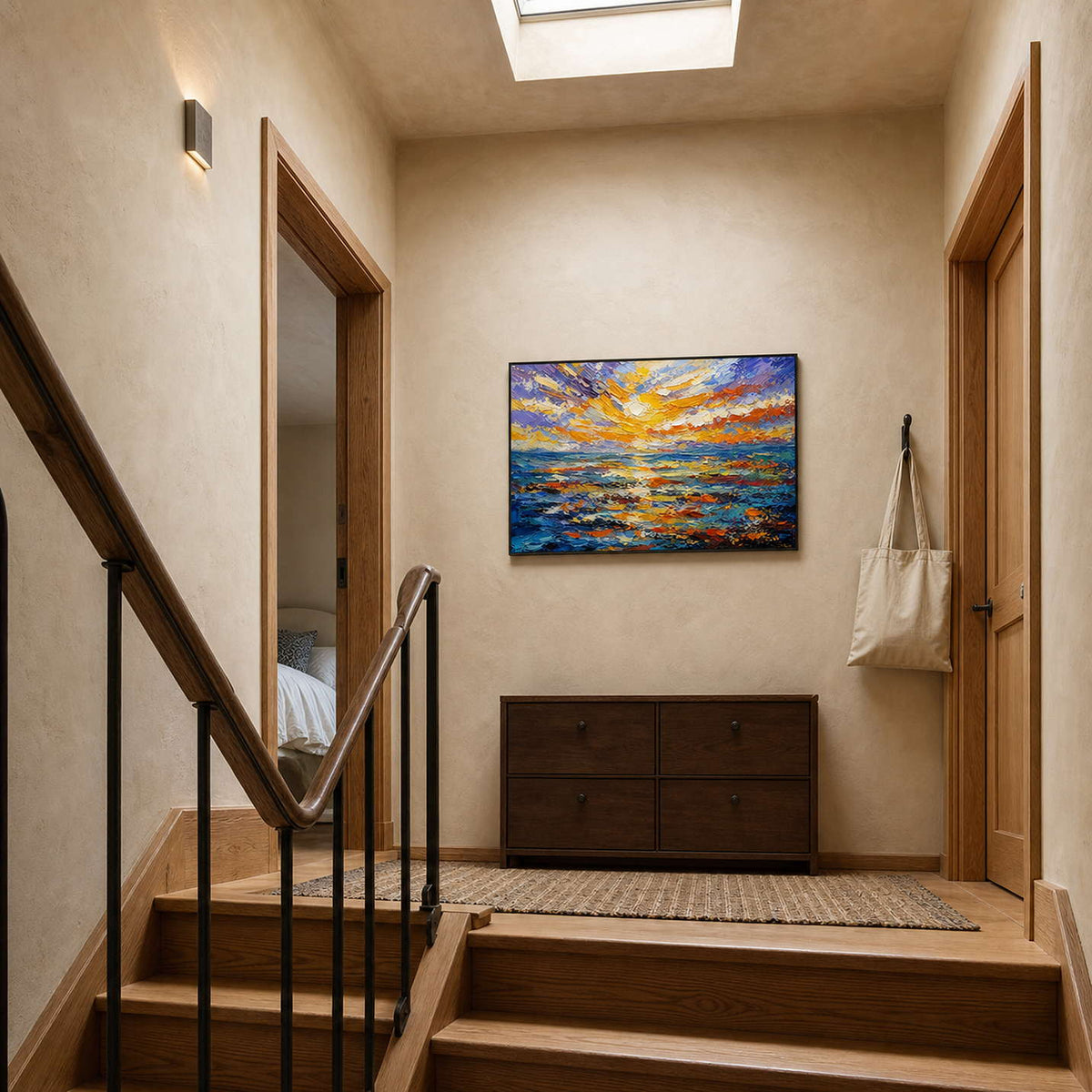 Horizontal sunset seascape adds color to a residential stair landing.