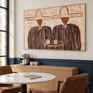 Wide table scene above a cabinet with a coffee machine.