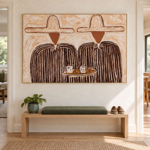 Cup-and-figure artwork above an entry bench with a green cushion.