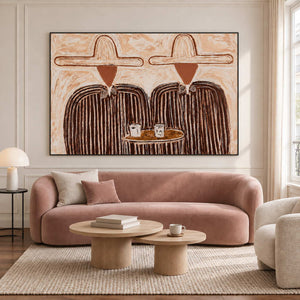 Two-cup portrait above a curved blush sofa.