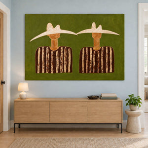 Green-ground artwork above a pale wooden sideboard.