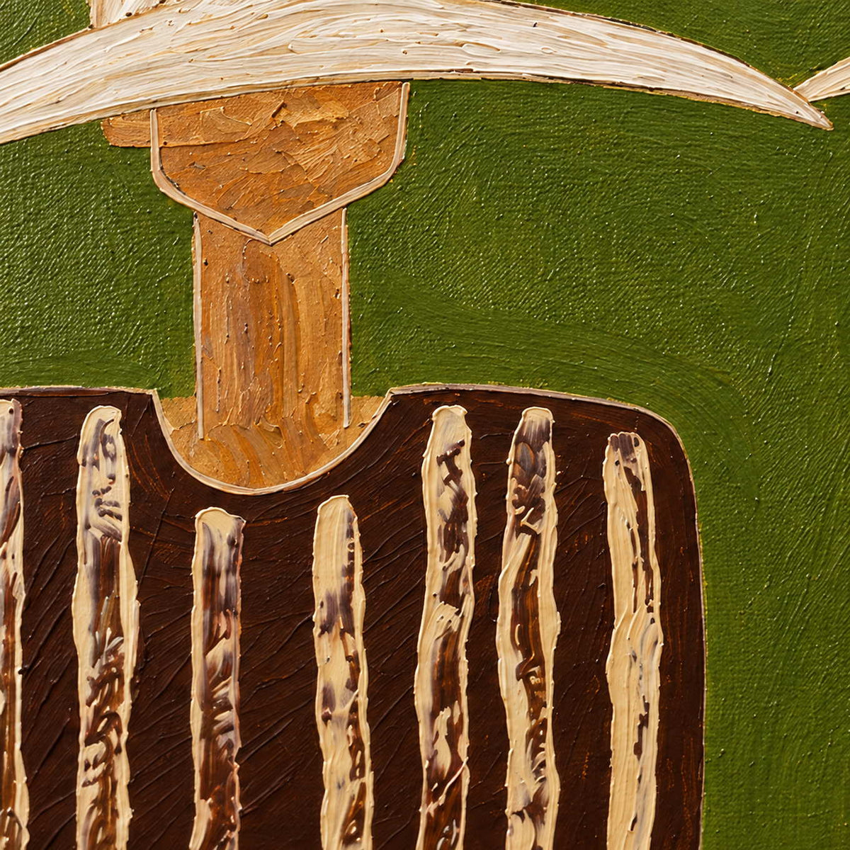 Detail of a cream brim, elongated neck, and rough pale stripes on brown.
