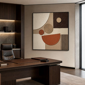 Warm square geometric wall art displayed in a dark modern office.