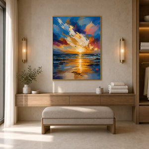 Golden blue coastal art warming a refined limestone hotel bathroom.