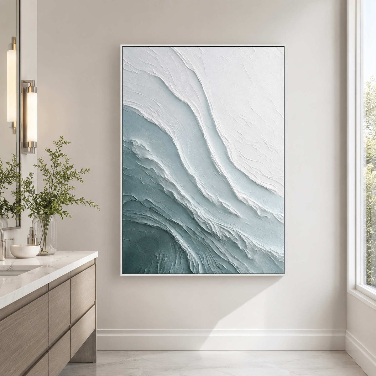 Vertical ocean inspired artwork in a calm modern bathroom