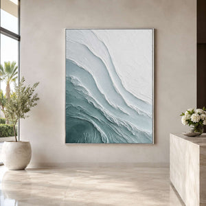 Layered coastal artwork in a serene modern hotel lobby