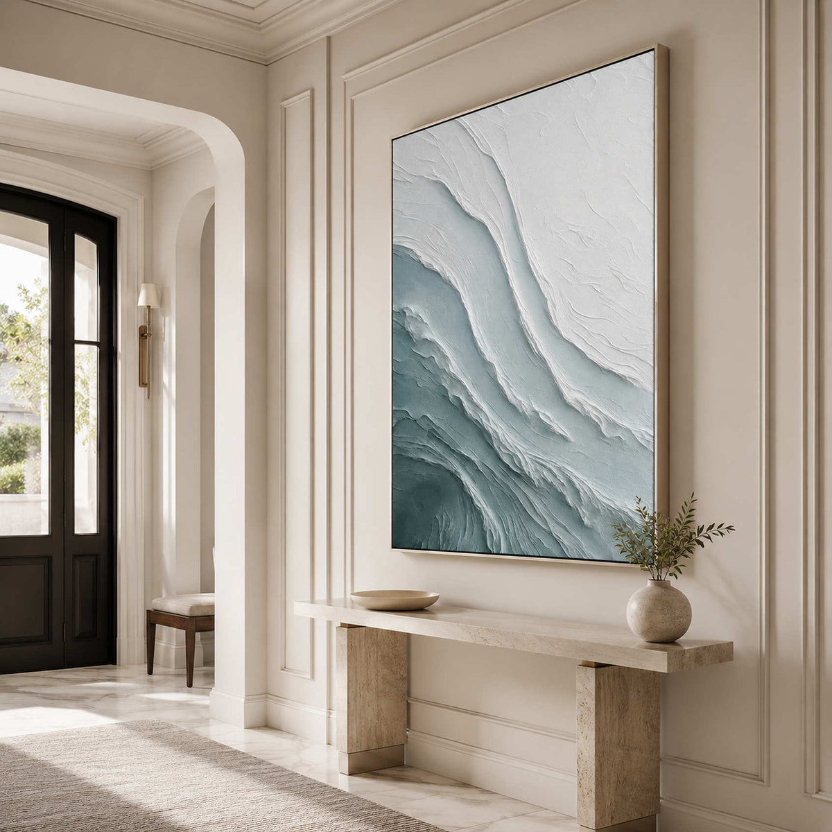 Coastal abstract artwork in a refined residential entryway