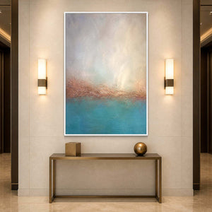 Luminous coastal painting displayed in an elegant hotel hallway.