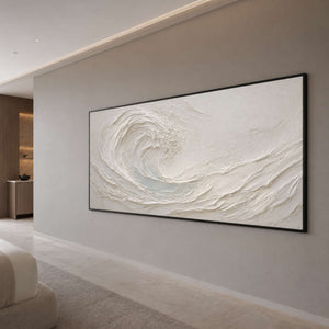 Textured coastal wall art displayed in an ocean-view hotel suite.