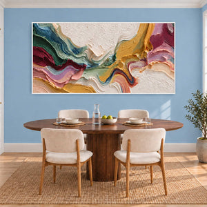 White-space color abstract above an oval dining table on a light blue wall.