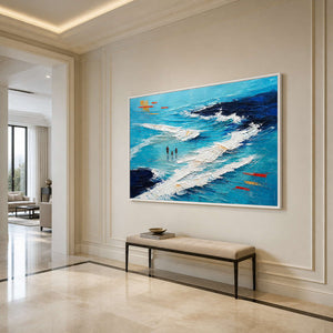 Turquoise coastal wall art displayed in an elegant luxury entryway.
