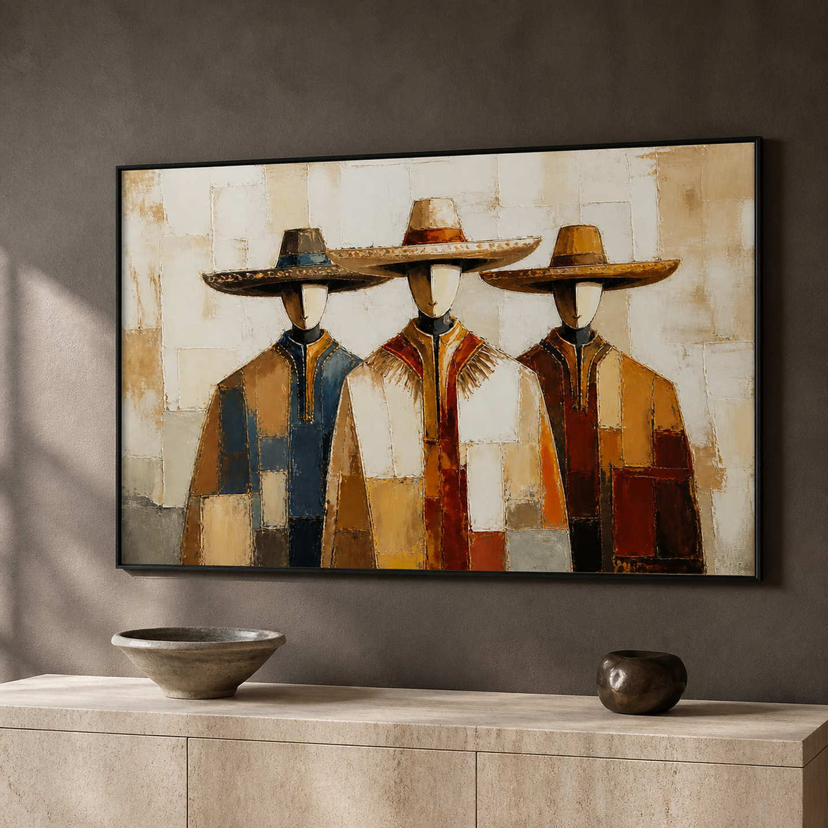 Three companions artwork displayed in a charcoal-brown modern office.
