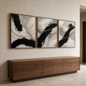 Three-panel abstract wall art displayed in a warm modern entryway.