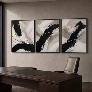 Black and gold abstract triptych displayed in a sophisticated dark office.