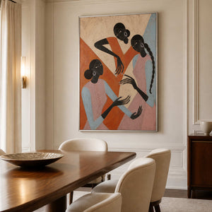 Three-figure artwork displayed in a warm refined dining room.