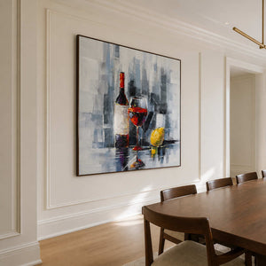 Wood framed wine still life beside a long wooden table in private dining.