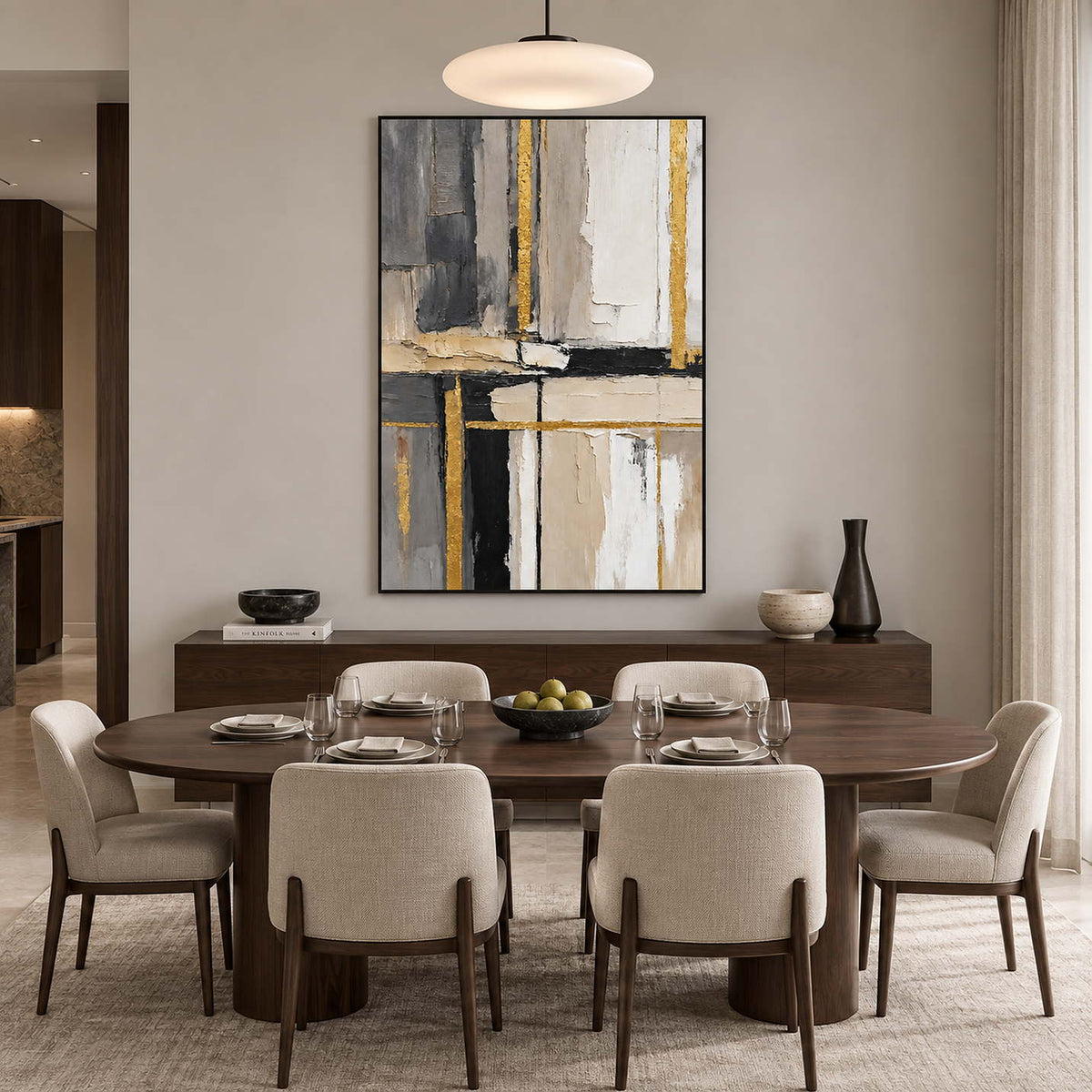 Tall gray and gold-accented artwork above a dark dining sideboard behind an oval table.