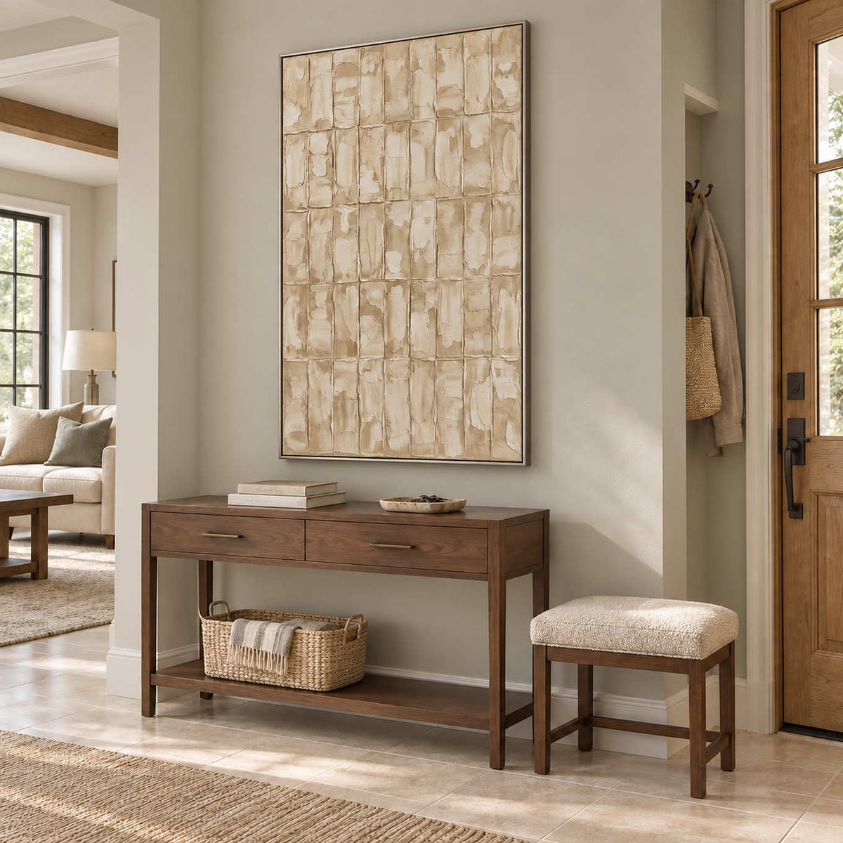 Time in Verse in a silver frame above a wood entryway console with a woven basket and a cream stool.