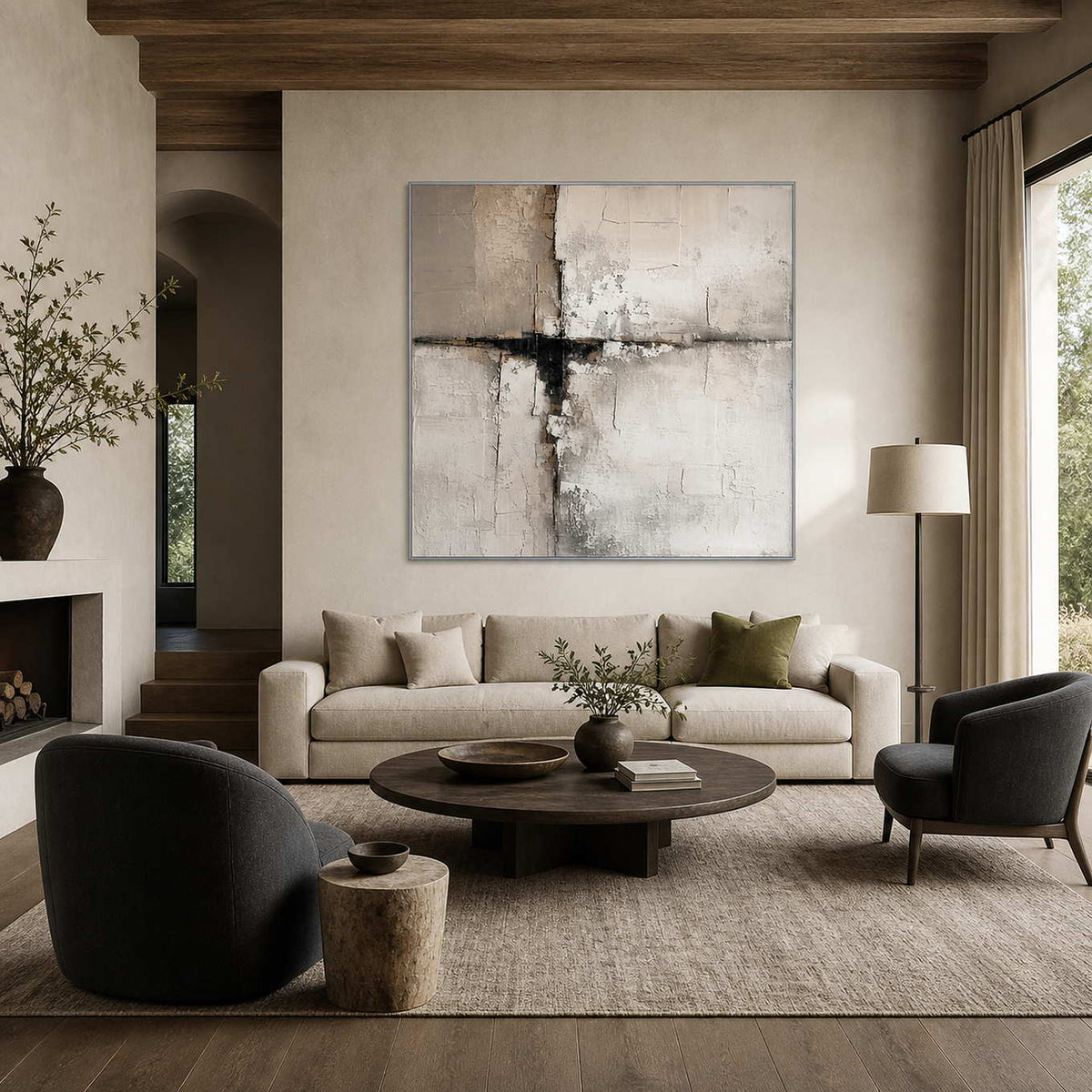 Silver framed neutral abstract artwork above a cream sofa in a timber ceiling living room.