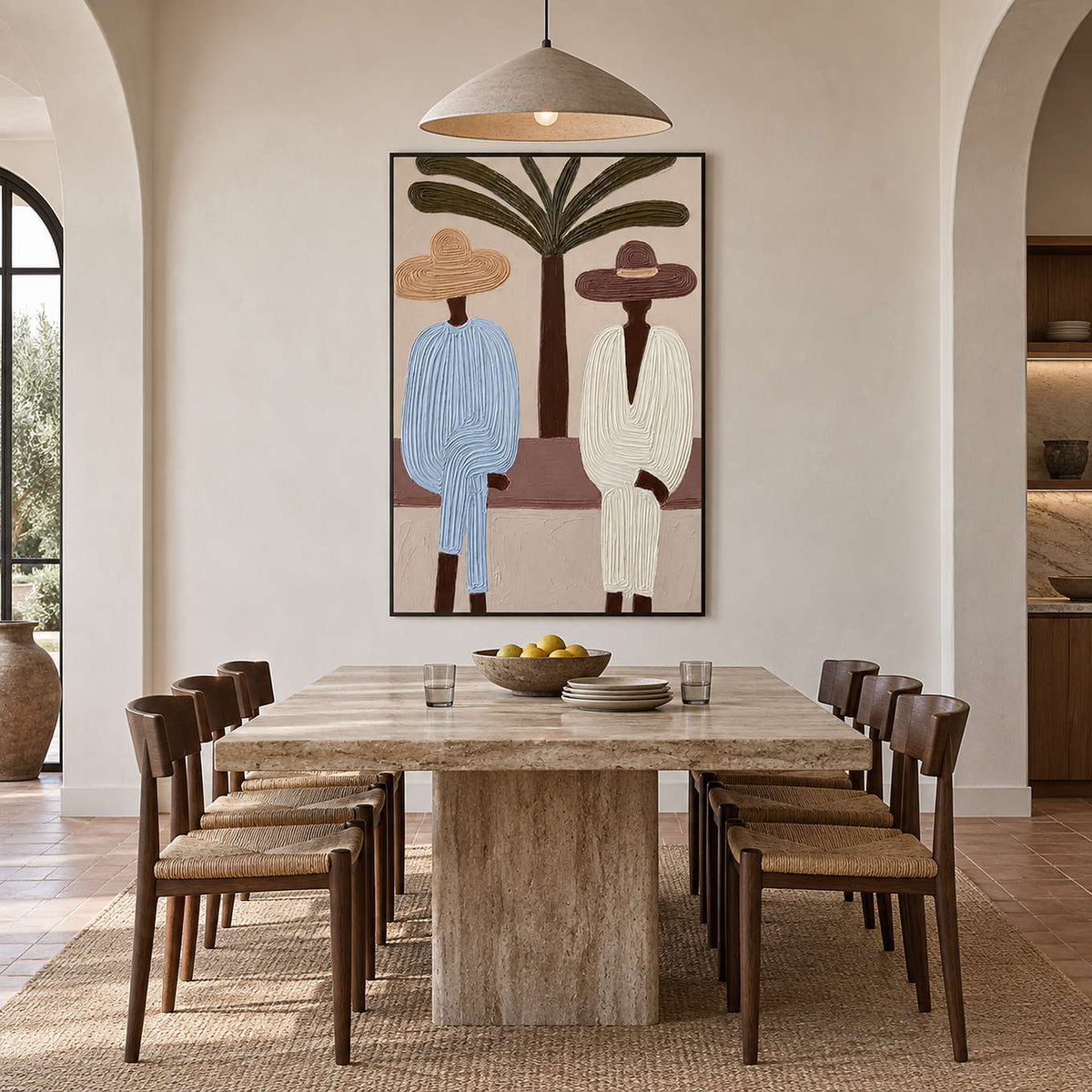 Tall two-figure painting above a pale dining table with dark wood woven-seat chairs.