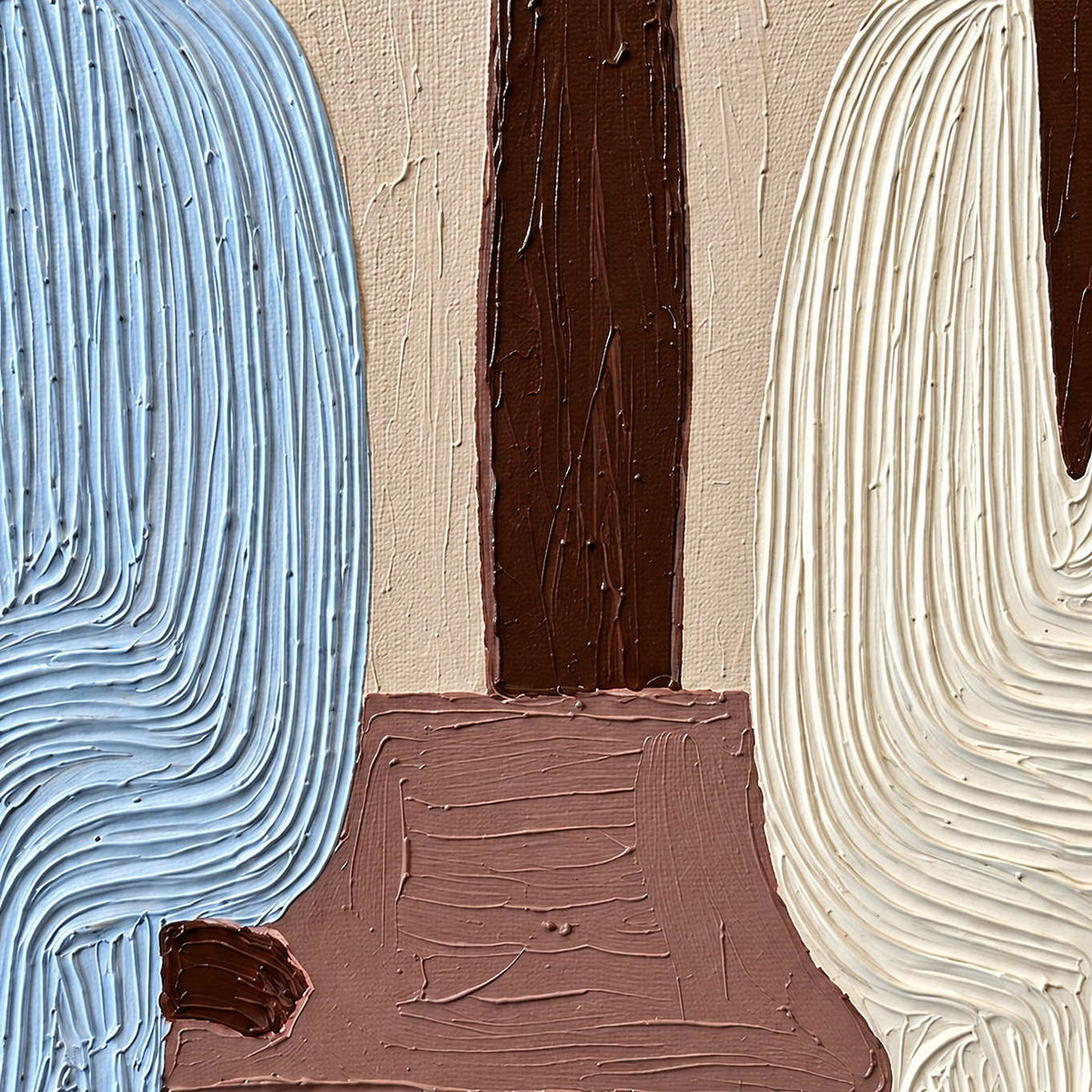 Detail of pale blue and cream ridged clothing beside a brown palm trunk and rose bench.