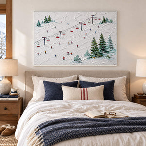 Snowy ski slope painting with red chairlifts, colorful skiers, and evergreen trees in a white frame in a bedroom.