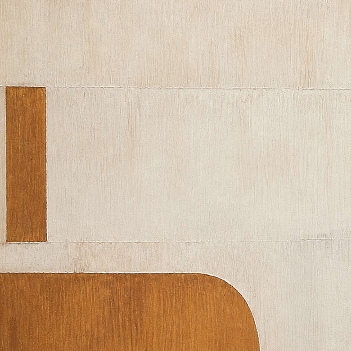 Close detail of ochre blocks and softly textured ivory surface