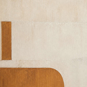 Close detail of ochre blocks and softly textured ivory surface