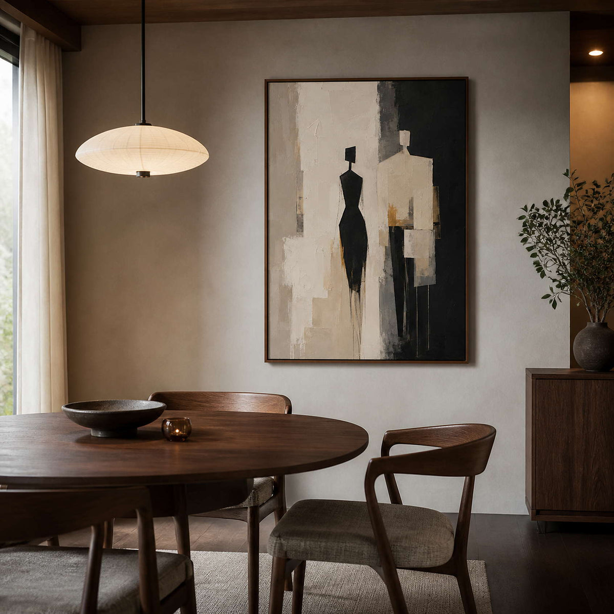 Textured figurative wall art displayed in a deep walnut dining room.