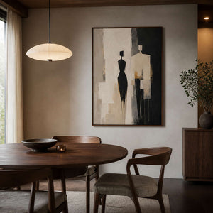 Textured figurative wall art displayed in a deep walnut dining room.