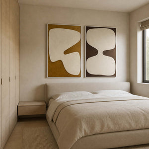 Organic ivory forms styled above a soft neutral modern bedroom.