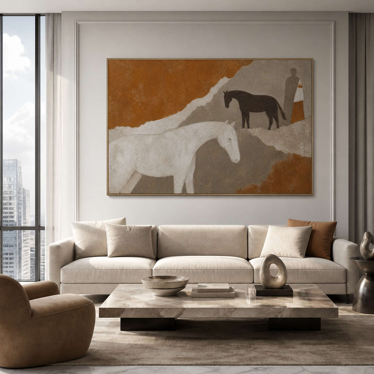Neutral horse wall art in a wood frame above a bright living room sofa.